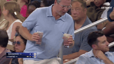 Confused Fan With Two Drinks animated GIF meme template